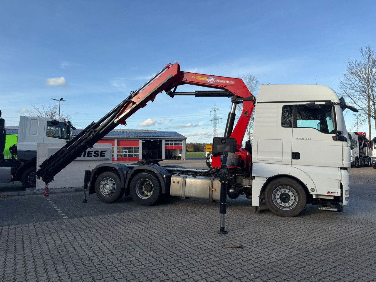 MAN TGX 26.440 6x2 mit HMF 3000-K5 Kran Top Zustand - Ťahač: obrázok 1 MAN TGX 26.440 6x2 mit HMF 3000-K5 Kran Top Zustand - Ťahač: obrázok 1