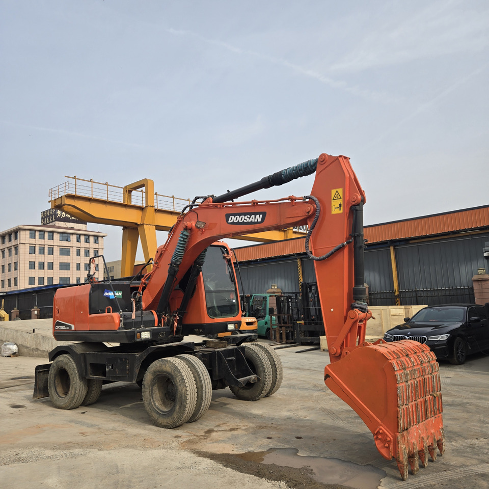 DOOSAN DX150W - Kolesové rýpadlo: obrázok 1 DOOSAN DX150W - Kolesové rýpadlo: obrázok 1
