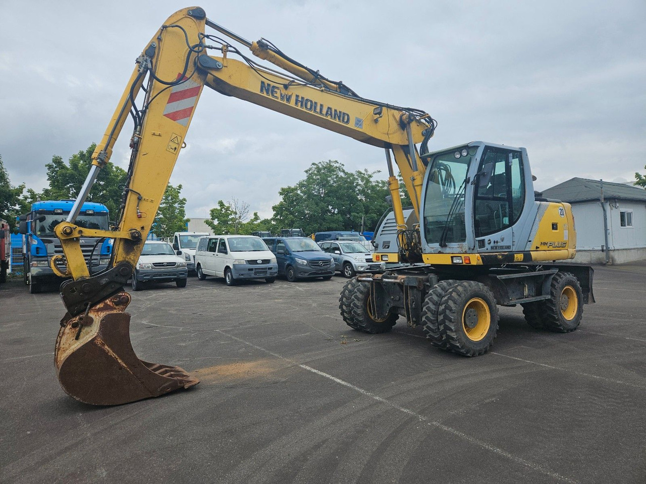 New Holland MH Plus 18t Mobilbagger - Kolesové rýpadlo: obrázok 1 New Holland MH Plus 18t Mobilbagger - Kolesové rýpadlo: obrázok 1