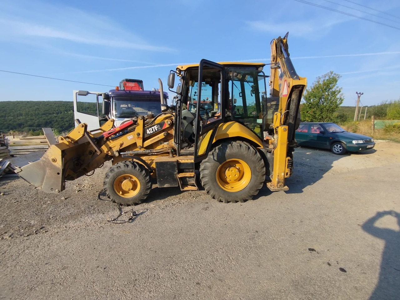 CATERPILLAR 472F2 - Rýpadlo-nakladač: obrázok 1 CATERPILLAR 472F2 - Rýpadlo-nakladač: obrázok 1