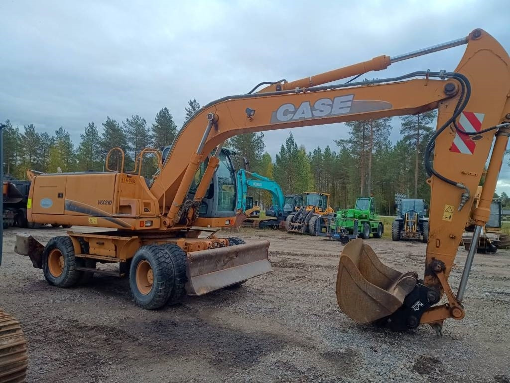 Case WX210 PYÖRITTÄJÄLLÄ  - Kolesové rýpadlo: obrázok 5 Case WX210 PYÖRITTÄJÄLLÄ  - Kolesové rýpadlo: obrázok 5