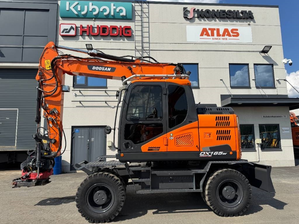 Doosan DX165W-5 PYÖRITTÄJÄLLÄ - Kolesové rýpadlo: obrázok 1 Doosan DX165W-5 PYÖRITTÄJÄLLÄ - Kolesové rýpadlo: obrázok 1