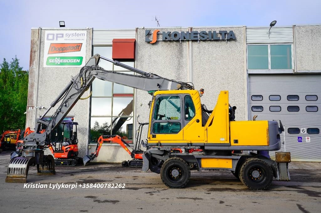 Volvo EW160B NOUSUHYTTI MATERIAALIKONE - Překládkové rýpadlo: obrázok 1 Volvo EW160B NOUSUHYTTI MATERIAALIKONE - Překládkové rýpadlo: obrázok 1