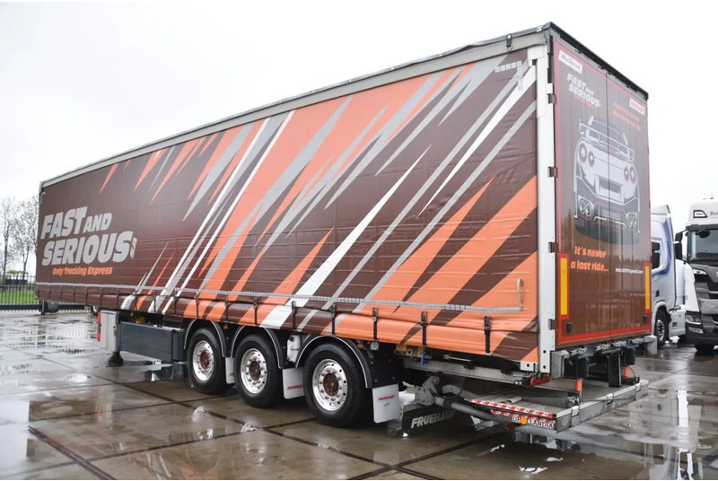 Fruehauf SLIDING CURTAINS/ROOF - TOPLIFT SYSTEM - LIFT AXLE - STEERING AXLE - SAF AXLES - ALCOA'S - DHOLLANDIA - TOP CONDITION - - Plachtový náves: obrázok 4 Fruehauf SLIDING CURTAINS/ROOF - TOPLIFT SYSTEM - LIFT AXLE - STEERING AXLE - SAF AXLES - ALCOA'S - DHOLLANDIA - TOP CONDITION - - Plachtový náves: obrázok 4
