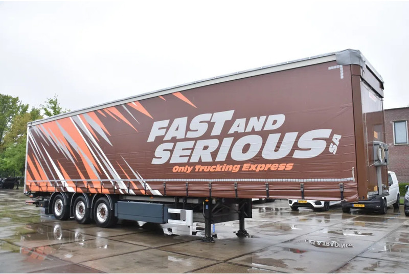 Fruehauf SLIDING CURTAINS/ROOF - TOPLIFT SYSTEM - LIFT AXLE - STEERING AXLE - SAF AXLES - ALCOA'S - DHOLLANDIA - TOP CONDITION - - Plachtový náves: obrázok 1 Fruehauf SLIDING CURTAINS/ROOF - TOPLIFT SYSTEM - LIFT AXLE - STEERING AXLE - SAF AXLES - ALCOA'S - DHOLLANDIA - TOP CONDITION - - Plachtový náves: obrázok 1