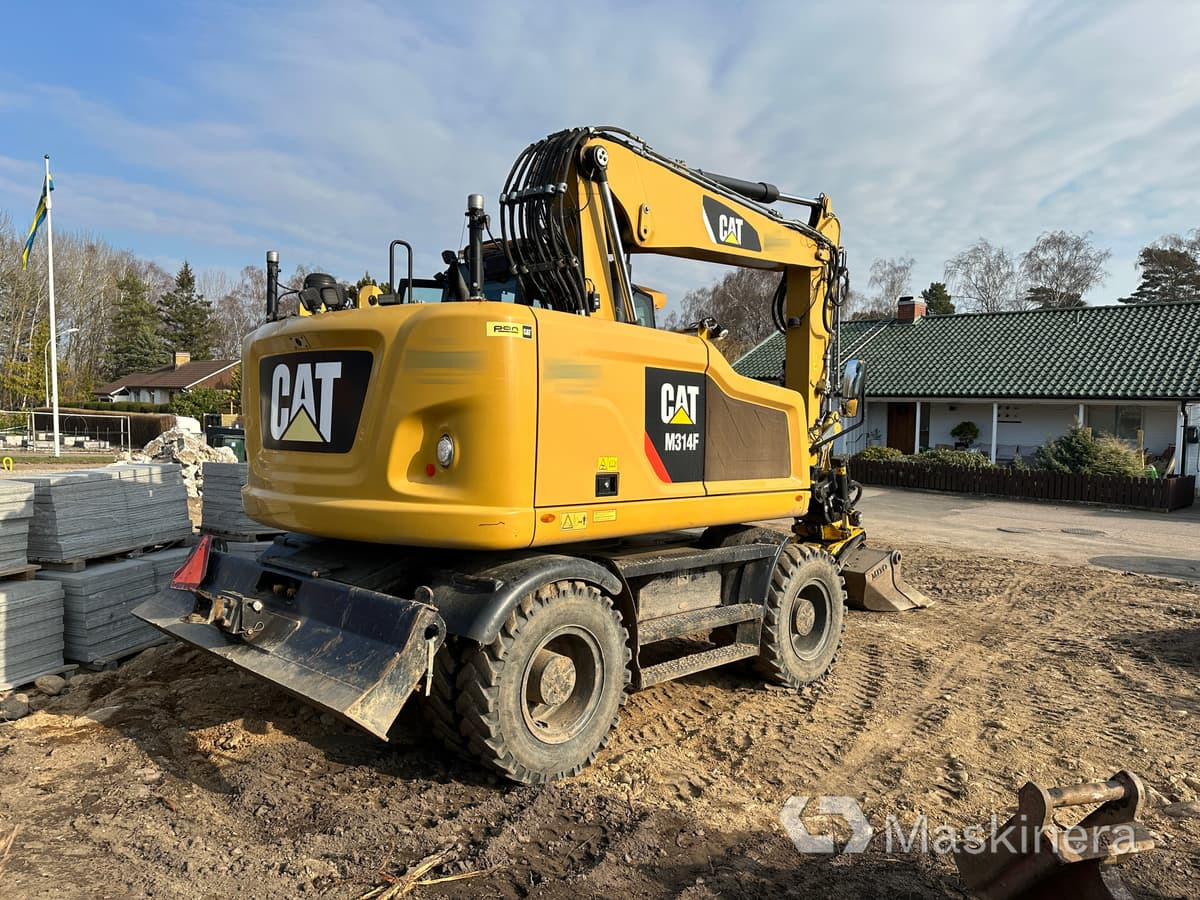 Hjulgrävare Cat M314F + redskap/vagn/grävsystem - Pásové rýpadlo: obrázok 2 Hjulgrävare Cat M314F + redskap/vagn/grävsystem - Pásové rýpadlo: obrázok 2
