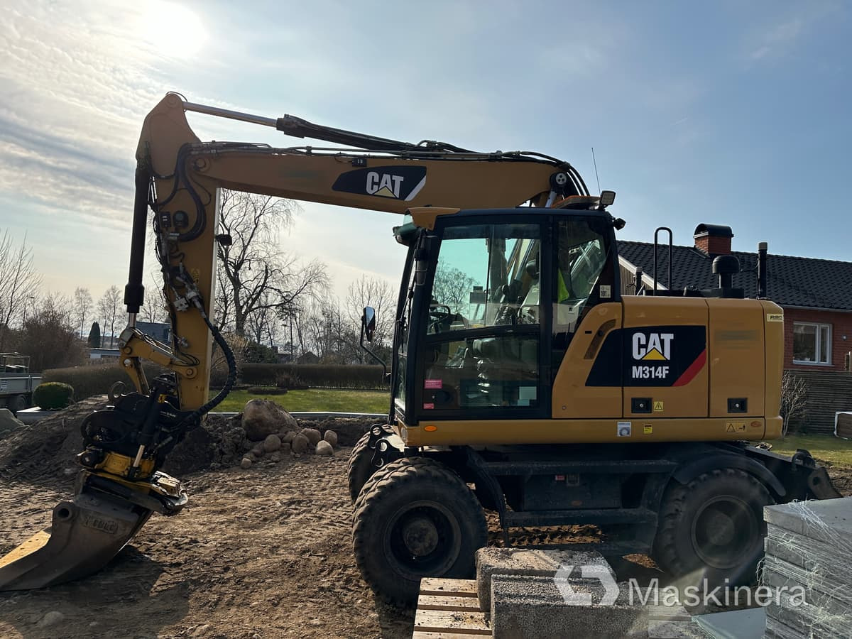 Hjulgrävare Cat M314F + redskap/vagn/grävsystem - Pásové rýpadlo: obrázok 5 Hjulgrävare Cat M314F + redskap/vagn/grävsystem - Pásové rýpadlo: obrázok 5
