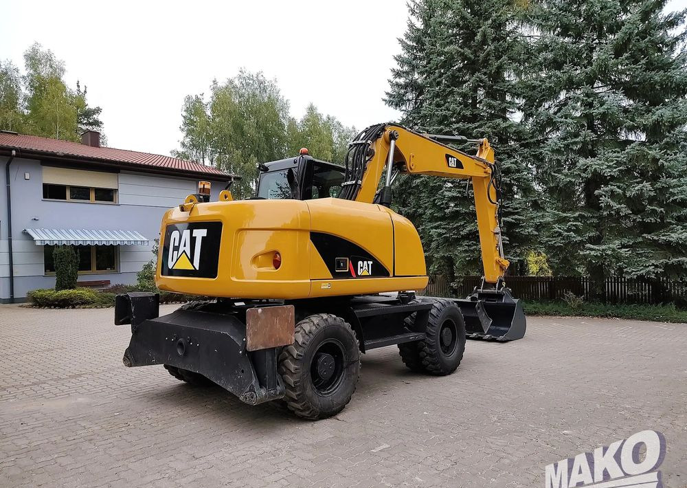 Caterpillar M313D - Kolesové rýpadlo: obrázok 4 Caterpillar M313D - Kolesové rýpadlo: obrázok 4