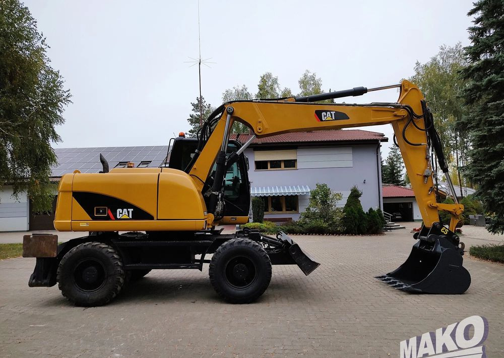Caterpillar M313D - Kolesové rýpadlo: obrázok 5 Caterpillar M313D - Kolesové rýpadlo: obrázok 5