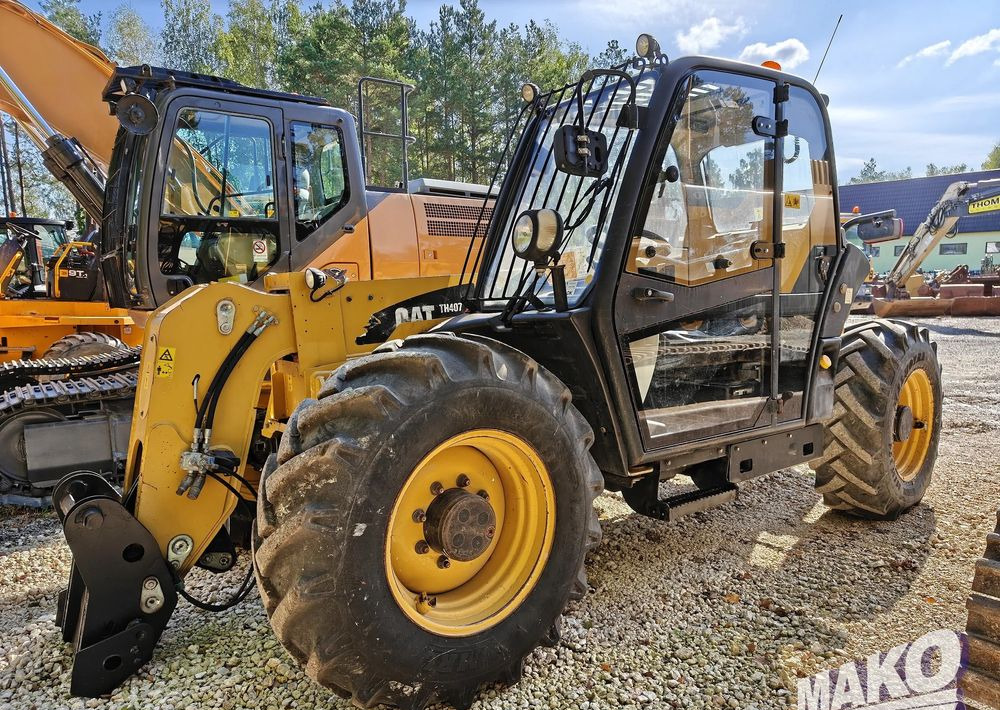 Caterpillar TH407 - Teleskopický nakladač: obrázok 1 Caterpillar TH407 - Teleskopický nakladač: obrázok 1
