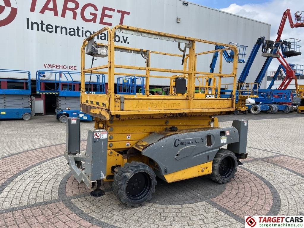 Haulotte Compact 12DX Diesel 4x4 Scissor Work Lift 1206cm - Samohybná plošiny: obrázok 1 Haulotte Compact 12DX Diesel 4x4 Scissor Work Lift 1206cm - Samohybná plošiny: obrázok 1