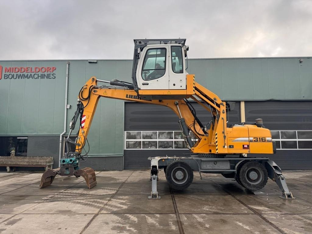 Liebherr A 316 - Překládkové rýpadlo: obrázok 1 Liebherr A 316 - Překládkové rýpadlo: obrázok 1