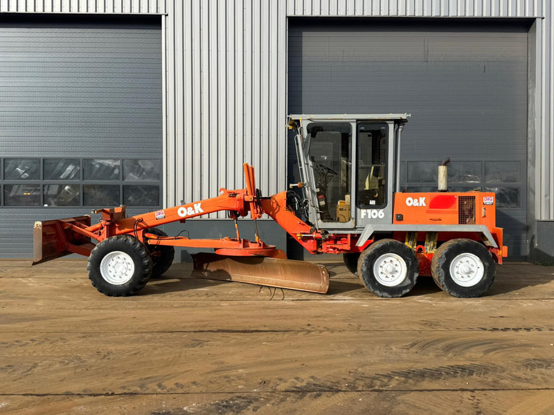 O & K F106A Motor Grader 6x6 - Zrovnávač: obrázok 1 O & K F106A Motor Grader 6x6 - Zrovnávač: obrázok 1