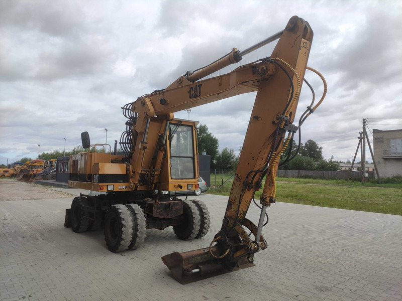 Caterpillar 214 B wheel excavator - Kolesové rýpadlo: obrázok 3 Caterpillar 214 B wheel excavator - Kolesové rýpadlo: obrázok 3