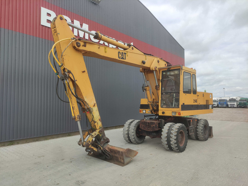 Caterpillar 214 B wheel excavator - Kolesové rýpadlo: obrázok 2 Caterpillar 214 B wheel excavator - Kolesové rýpadlo: obrázok 2