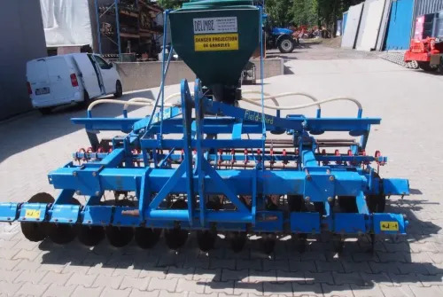 Agregat uprawowo-siewny Rabe Werk 2011 3m brona talerzowa z siewnikiem do poplonów - Modulárny sejací stroj: obrázok 4 Agregat uprawowo-siewny Rabe Werk 2011 3m brona talerzowa z siewnikiem do poplonów - Modulárny sejací stroj: obrázok 4