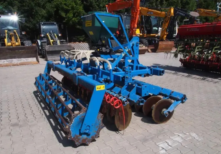 Agregat uprawowo-siewny Rabe Werk 2011 3m brona talerzowa z siewnikiem do poplonów - Modulárny sejací stroj: obrázok 5 Agregat uprawowo-siewny Rabe Werk 2011 3m brona talerzowa z siewnikiem do poplonów - Modulárny sejací stroj: obrázok 5