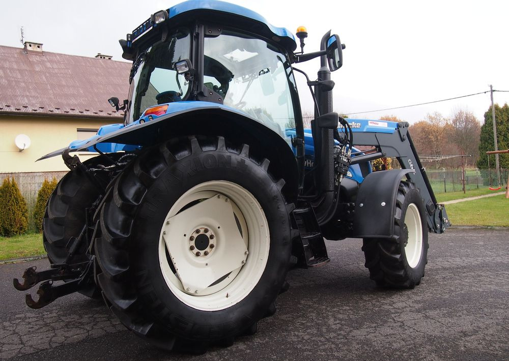 Ciągnik New Holland NH TS125A 6 cylindrów 2004 Ciągnik rolniczy New Holland TS125A - Traktor: obrázok 4 Ciągnik New Holland NH TS125A 6 cylindrów 2004 Ciągnik rolniczy New Holland TS125A - Traktor: obrázok 4