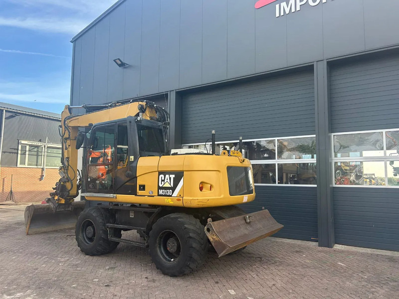 Caterpillar M313D - Kolesové rýpadlo: obrázok 2 Caterpillar M313D - Kolesové rýpadlo: obrázok 2