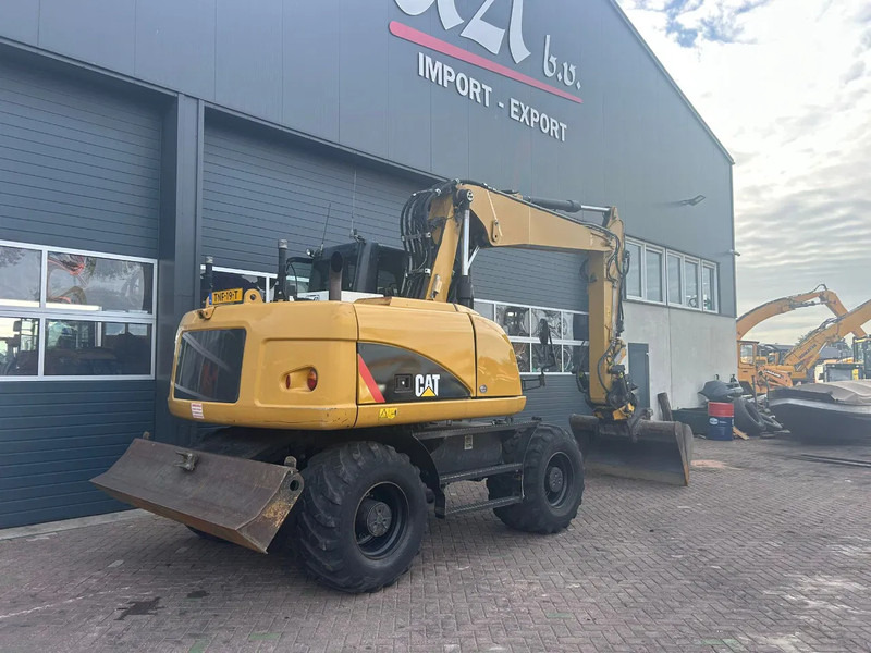 Caterpillar M313D - Kolesové rýpadlo: obrázok 4 Caterpillar M313D - Kolesové rýpadlo: obrázok 4
