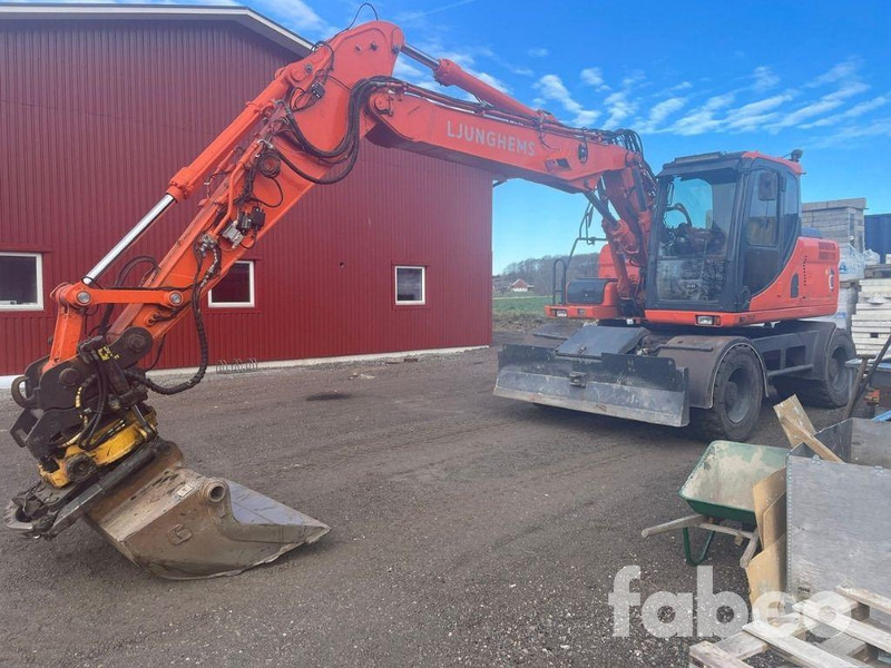 Doosan DX160W - Kolesové rýpadlo: obrázok 1 Doosan DX160W - Kolesové rýpadlo: obrázok 1