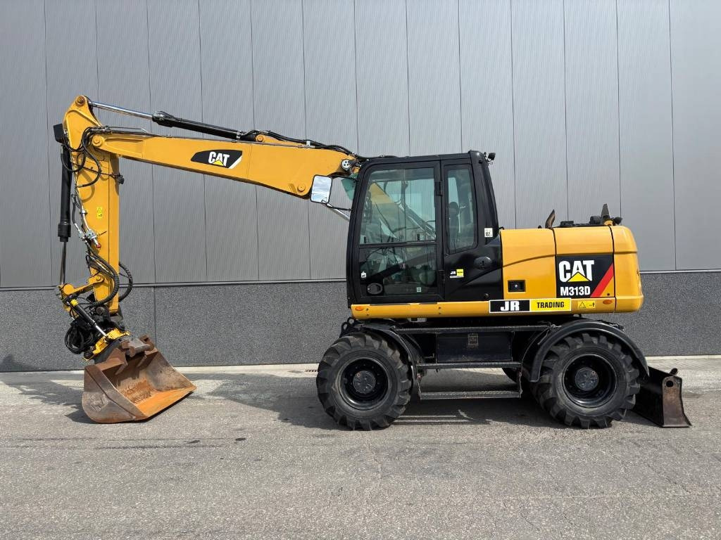 CAT M 313 D - Kolesové rýpadlo: obrázok 1 CAT M 313 D - Kolesové rýpadlo: obrázok 1