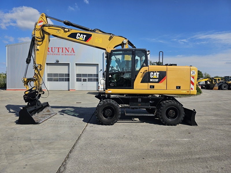 CATERPILLAR M320F - Kolesové rýpadlo: obrázok 1 CATERPILLAR M320F - Kolesové rýpadlo: obrázok 1