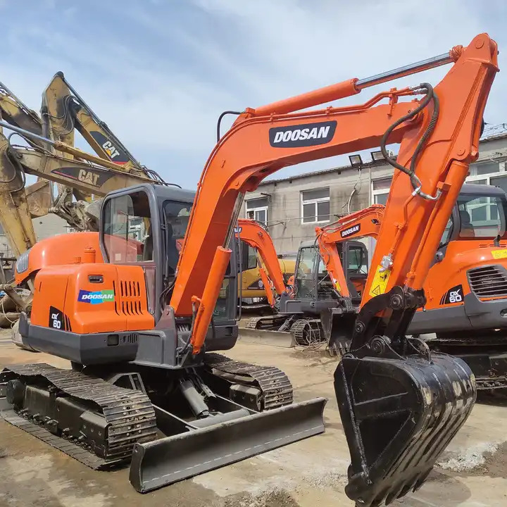 Doosan DX60 Mini Wheel Excavator for Sale Provided Korea Good Construction Original Korea Doosan Engine 6 T,6 Ton in stock - Pásové rýpadlo: obrázok 1 Doosan DX60 Mini Wheel Excavator for Sale Provided Korea Good Construction Original Korea Doosan Engine 6 T,6 Ton in stock - Pásové rýpadlo: obrázok 1