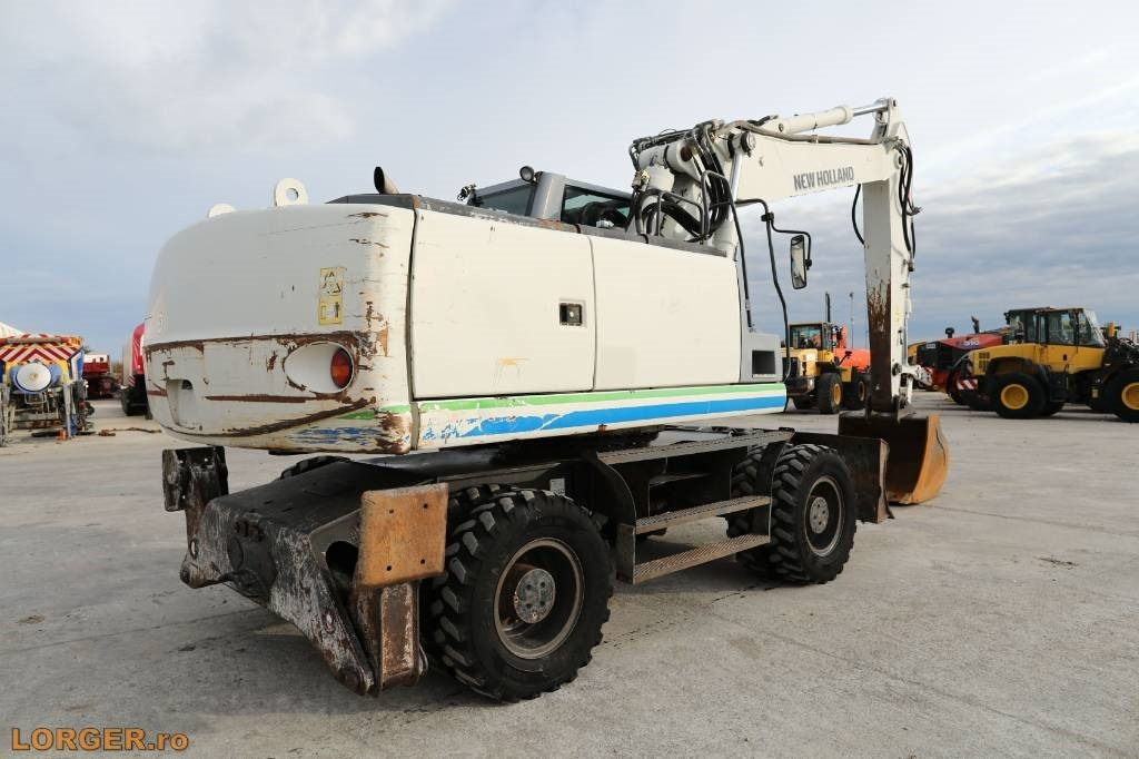 New Holland MH 6.6 + Sandvic Hammer - Kolesové rýpadlo: obrázok 4 New Holland MH 6.6 + Sandvic Hammer - Kolesové rýpadlo: obrázok 4