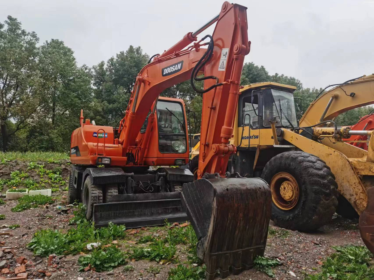 DOOSAN DH150W-7 - Kolesové rýpadlo: obrázok 1 DOOSAN DH150W-7 - Kolesové rýpadlo: obrázok 1