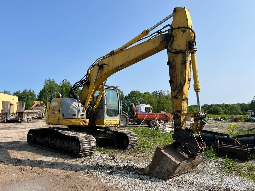 NEW HOLLAND KOBELCO E235BSRLC-2 - Pásové rýpadlo: obrázok 2 NEW HOLLAND KOBELCO E235BSRLC-2 - Pásové rýpadlo: obrázok 2