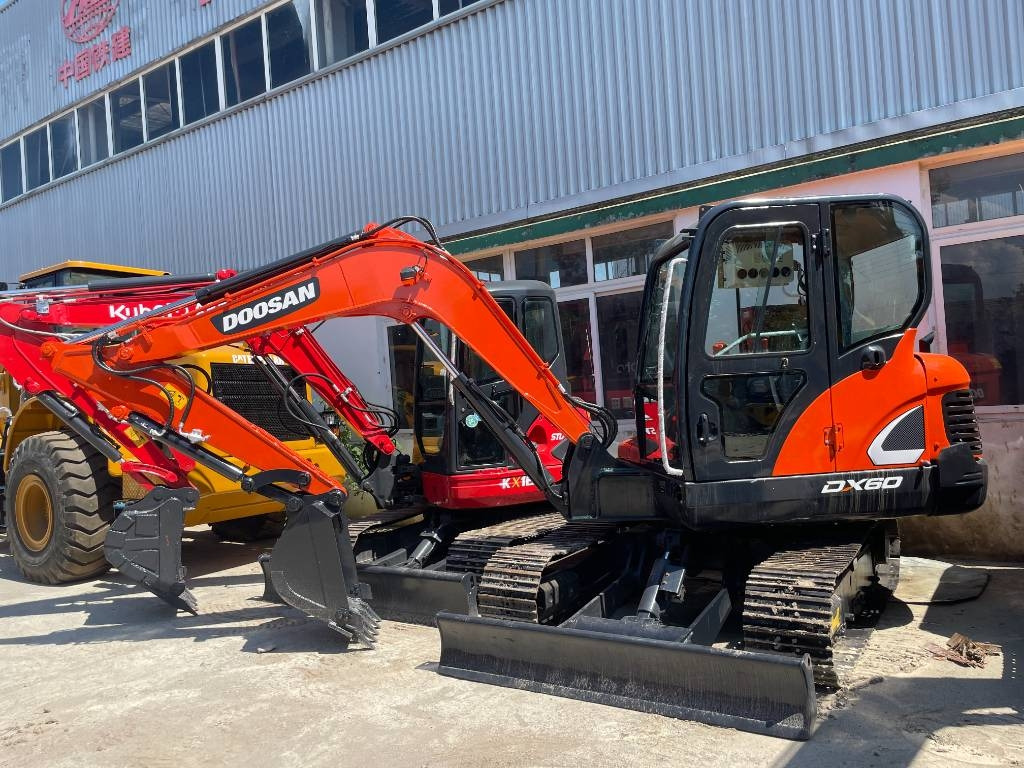 Doosan DX 60 - Mini rýpadlo: obrázok 1 Doosan DX 60 - Mini rýpadlo: obrázok 1