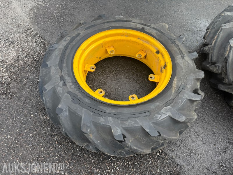 1 GoodYear 12.4-24 traktordekk med felg - Poľnohospodárske stroje: obrázok 1 1 GoodYear 12.4-24 traktordekk med felg - Poľnohospodárske stroje: obrázok 1