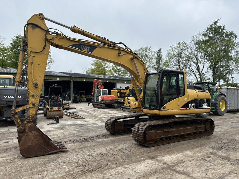 Caterpillar 318 CL (not 320CL - 325CL) - Pásové rýpadlo: obrázok 1 Caterpillar 318 CL (not 320CL - 325CL) - Pásové rýpadlo: obrázok 1