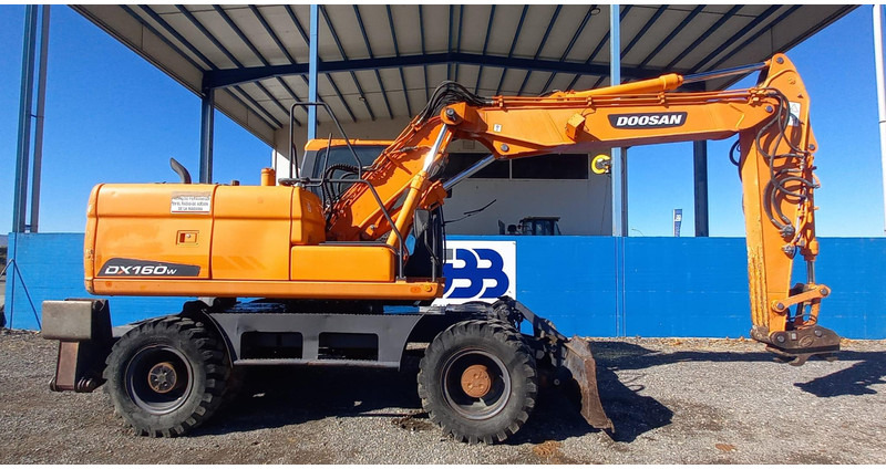 Doosan DX140W-3 - Kolesové rýpadlo: obrázok 2 Doosan DX140W-3 - Kolesové rýpadlo: obrázok 2