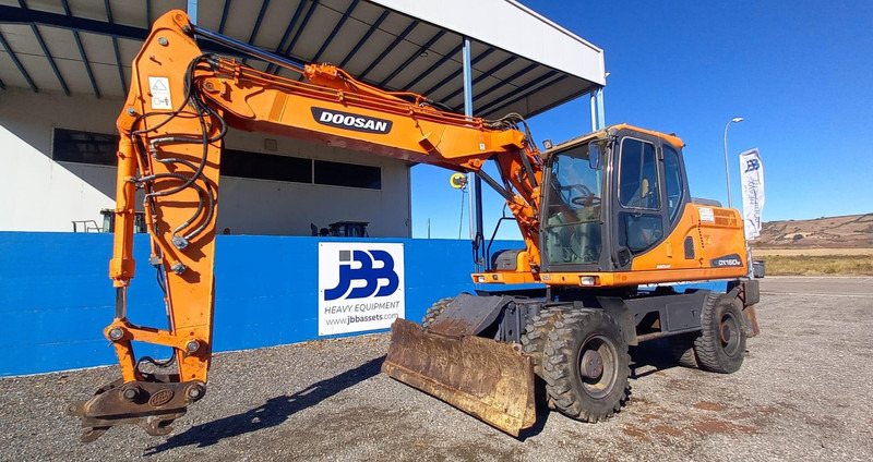 Doosan DX140W-3 - Kolesové rýpadlo: obrázok 5 Doosan DX140W-3 - Kolesové rýpadlo: obrázok 5
