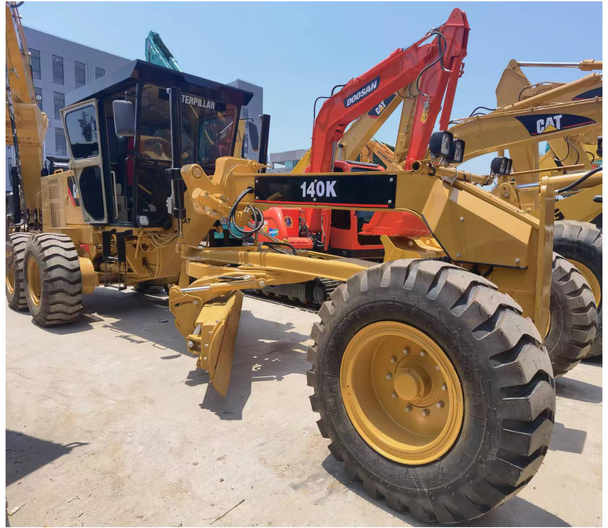 Made in Japan Motor grader used Caterpillar CAT 140k 140G 140K 12H on discount - Zrovnávač: obrázok 1 Made in Japan Motor grader used Caterpillar CAT 140k 140G 140K 12H on discount - Zrovnávač: obrázok 1