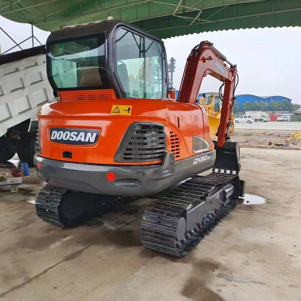 Doosan DX 60 - Mini rýpadlo: obrázok 1 Doosan DX 60 - Mini rýpadlo: obrázok 1