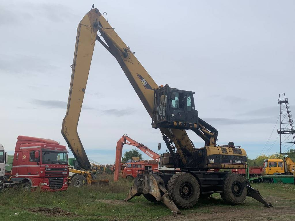 CAT M 325 C L MH - Překládkové rýpadlo: obrázok 1 CAT M 325 C L MH - Překládkové rýpadlo: obrázok 1