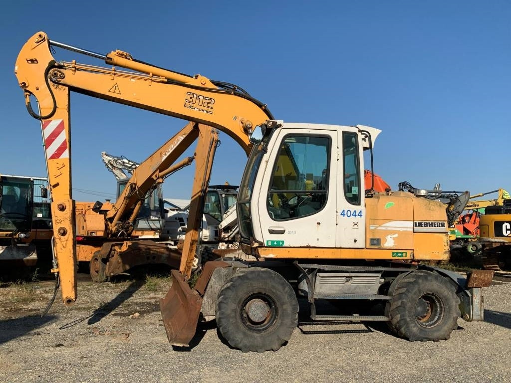 Liebherr A 312 - Kolesové rýpadlo: obrázok 2 Liebherr A 312 - Kolesové rýpadlo: obrázok 2