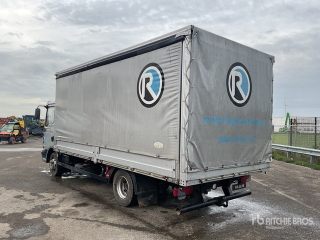 2007 MAN TGL12.210 4x2 Curtain Side Truck - Plachtové nákladné vozidlo: obrázok 1 2007 MAN TGL12.210 4x2 Curtain Side Truck - Plachtové nákladné vozidlo: obrázok 1