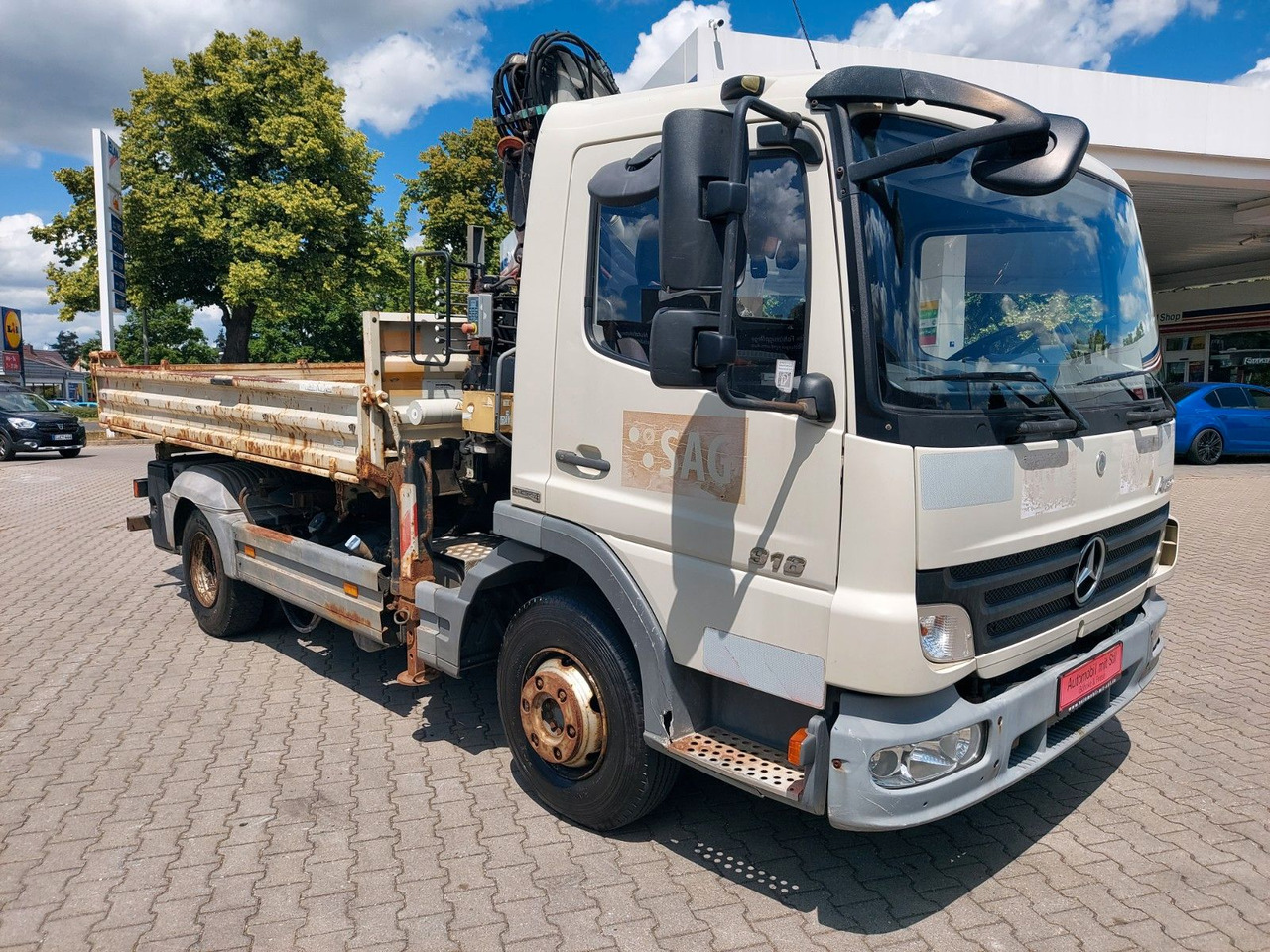 Mercedes-Benz Atego 2 918 3-Seiten Kipper KRAN TEREX 65.2 - Sklápač, Auto s hydraulickou rukou: obrázok 1 Mercedes-Benz Atego 2 918 3-Seiten Kipper KRAN TEREX 65.2 - Sklápač, Auto s hydraulickou rukou: obrázok 1