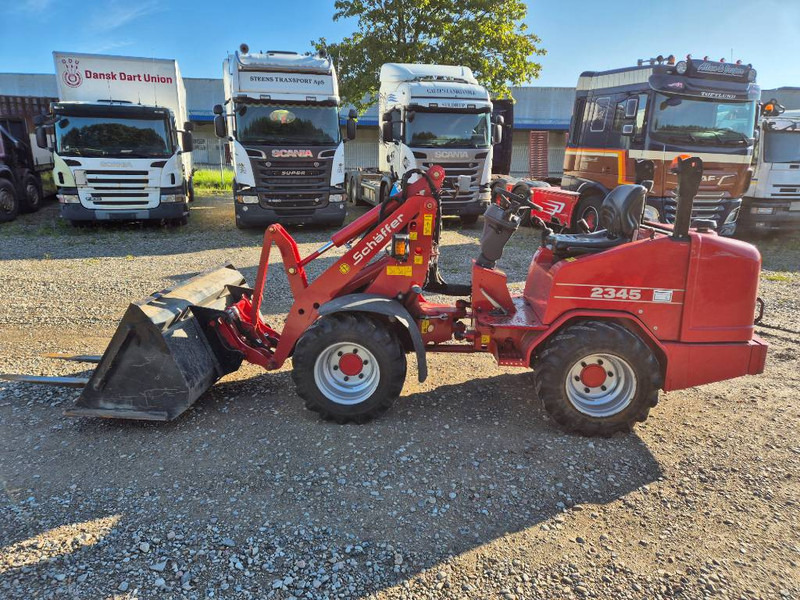 Schäffer 2345 (Bucket/Forks) - Pásový šmykom riadený nakladač: obrázok 1 Schäffer 2345 (Bucket/Forks) - Pásový šmykom riadený nakladač: obrázok 1