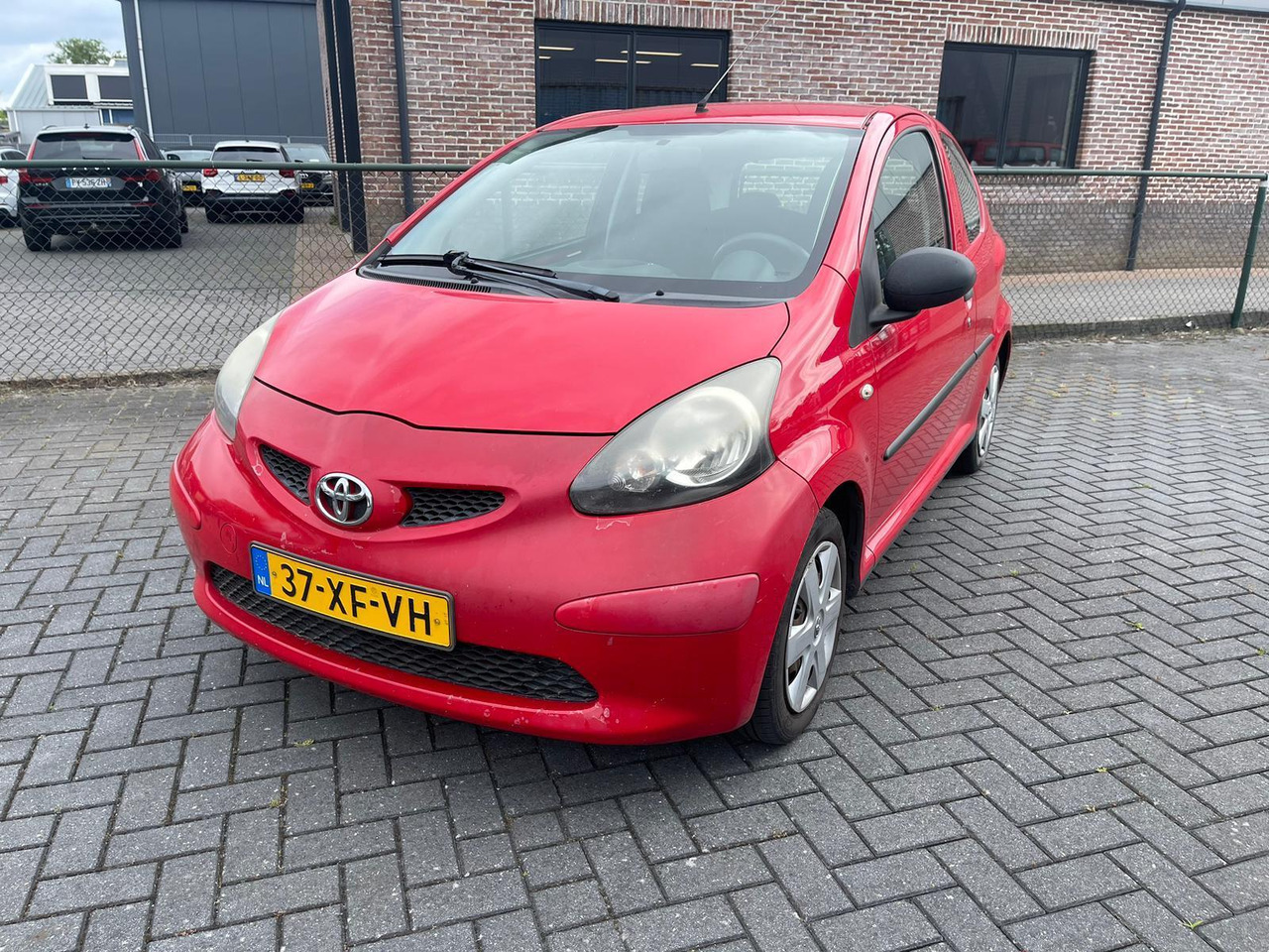 Toyota Aygo 1.0 12V 2007 247.975 km 37-XF-VH - Hatchback: obrázok 1 Toyota Aygo 1.0 12V 2007 247.975 km 37-XF-VH - Hatchback: obrázok 1