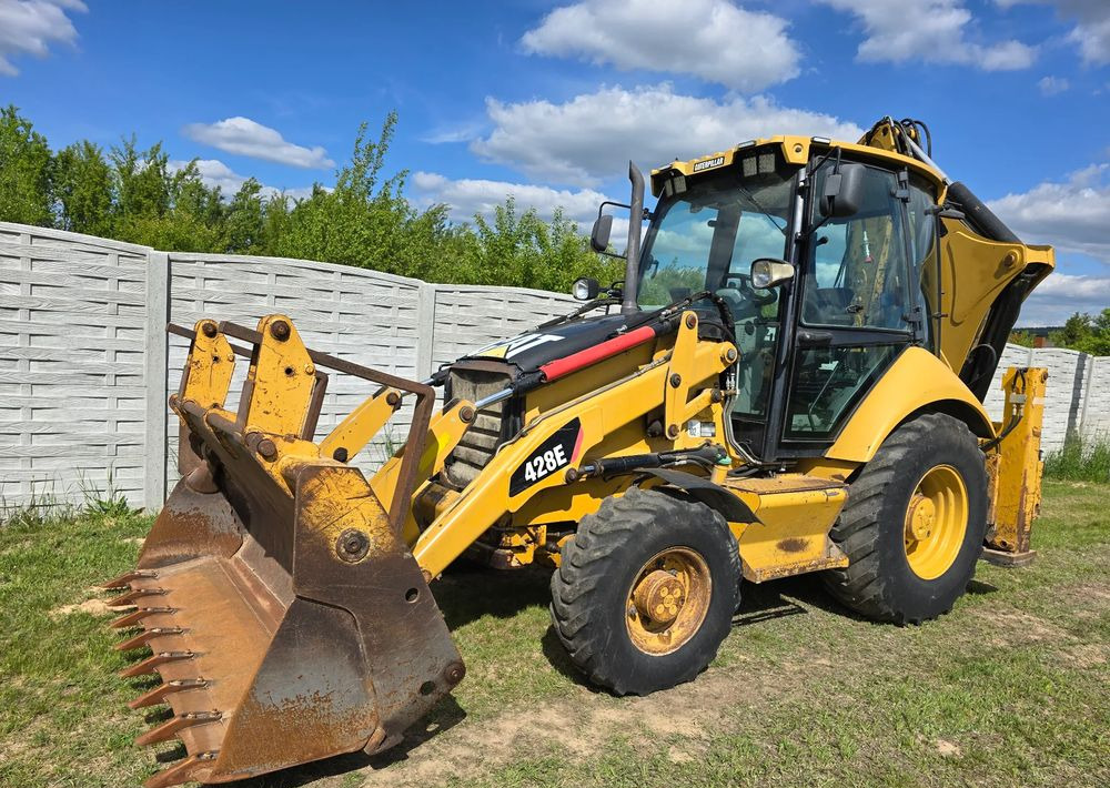 Caterpillar - Rýpadlo-nakladač: obrázok 1 Caterpillar - Rýpadlo-nakladač: obrázok 1