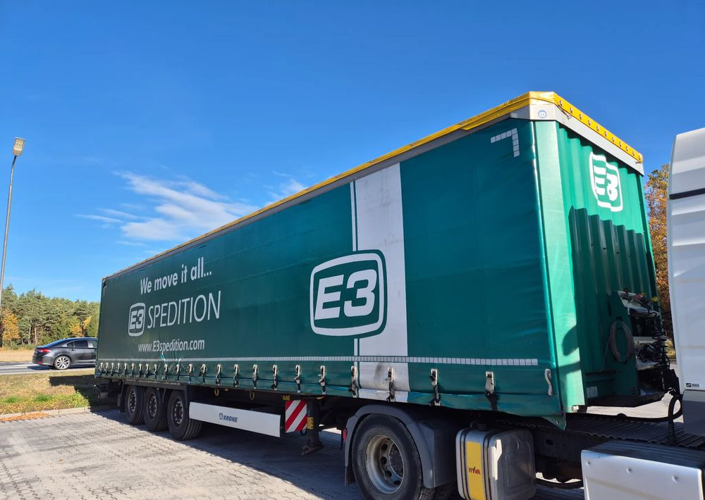 Krone BDE STANDARD PODNOSZONY DACH / z Niemiec PONADGABARYTY POSZERZANA OPONY 80% - Plachtový náves: obrázok 1 Krone BDE STANDARD PODNOSZONY DACH / z Niemiec PONADGABARYTY POSZERZANA OPONY 80% - Plachtový náves: obrázok 1