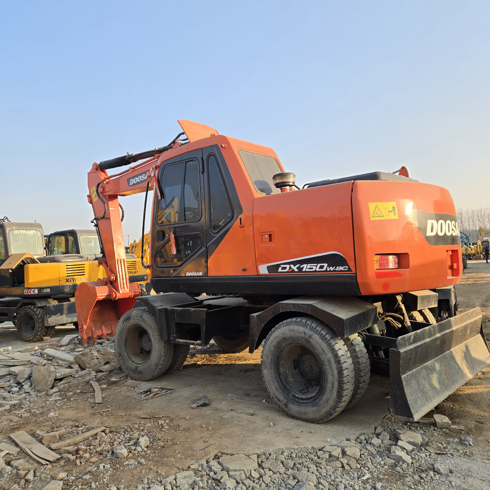 Doosan DX150W-9C - Kolesové rýpadlo: obrázok 2 Doosan DX150W-9C - Kolesové rýpadlo: obrázok 2