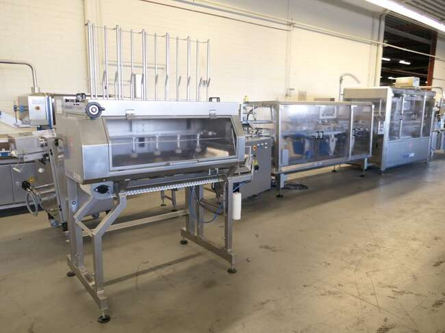 Tramper filling- and traysealing line GMD99-2 - Baliaci stroj: obrázok 1 Tramper filling- and traysealing line GMD99-2 - Baliaci stroj: obrázok 1