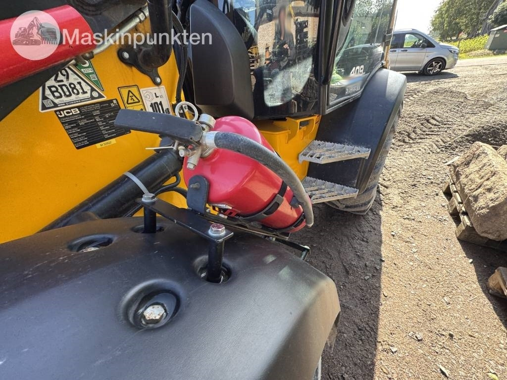 Kolesový nakladač JCB 409: obrázok 43