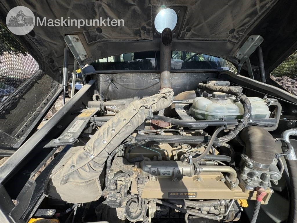 Kolesový nakladač JCB 409: obrázok 7
